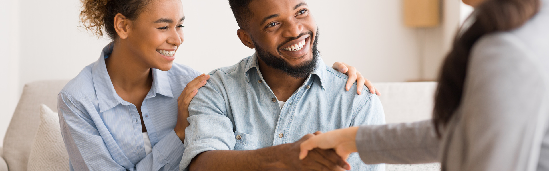 Couple Handshaking With Marital Therapist